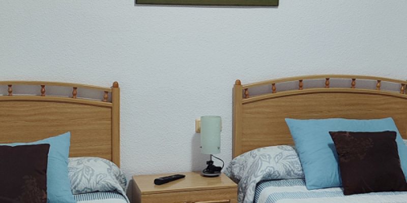 Detalle habitación doble azul Hostal La Llave Detalle habitación doble azul Hostal La Llave